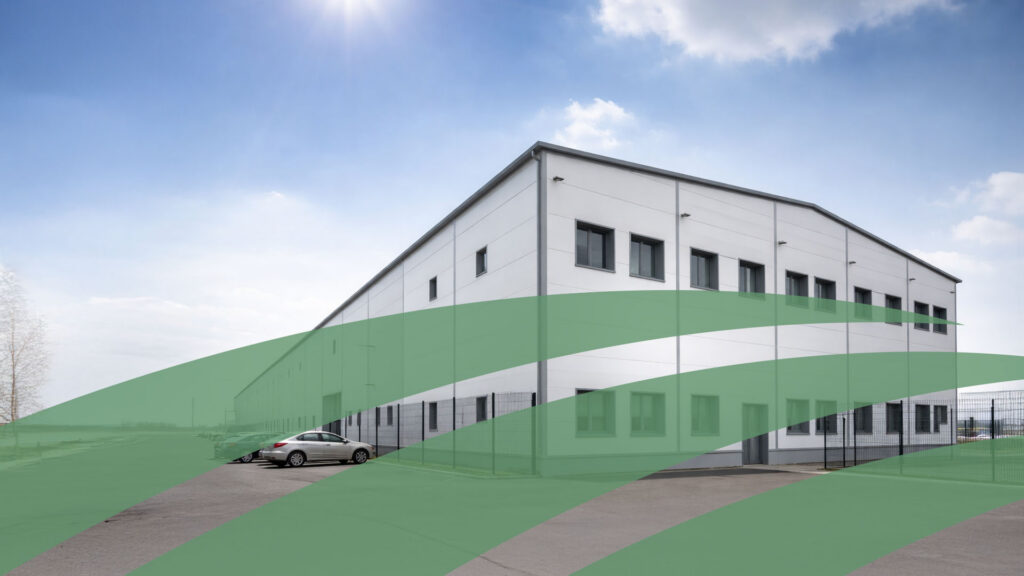 Huge warehouse with corrugated roof with green graphic