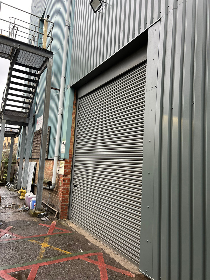 New green cladding on warehouse