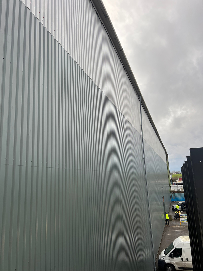 Green cladding on large warehouse