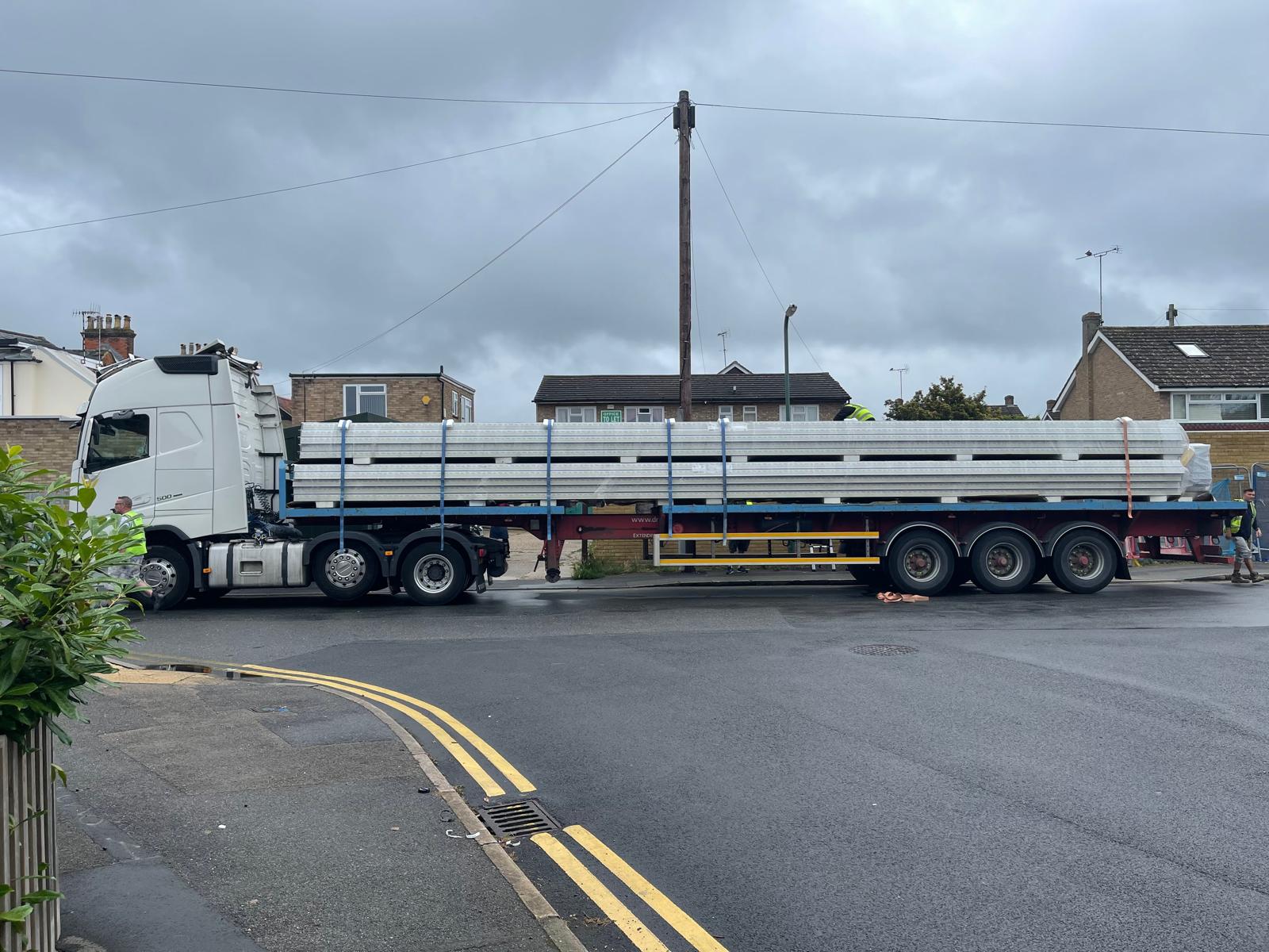 roofing materials arriving for roof installation