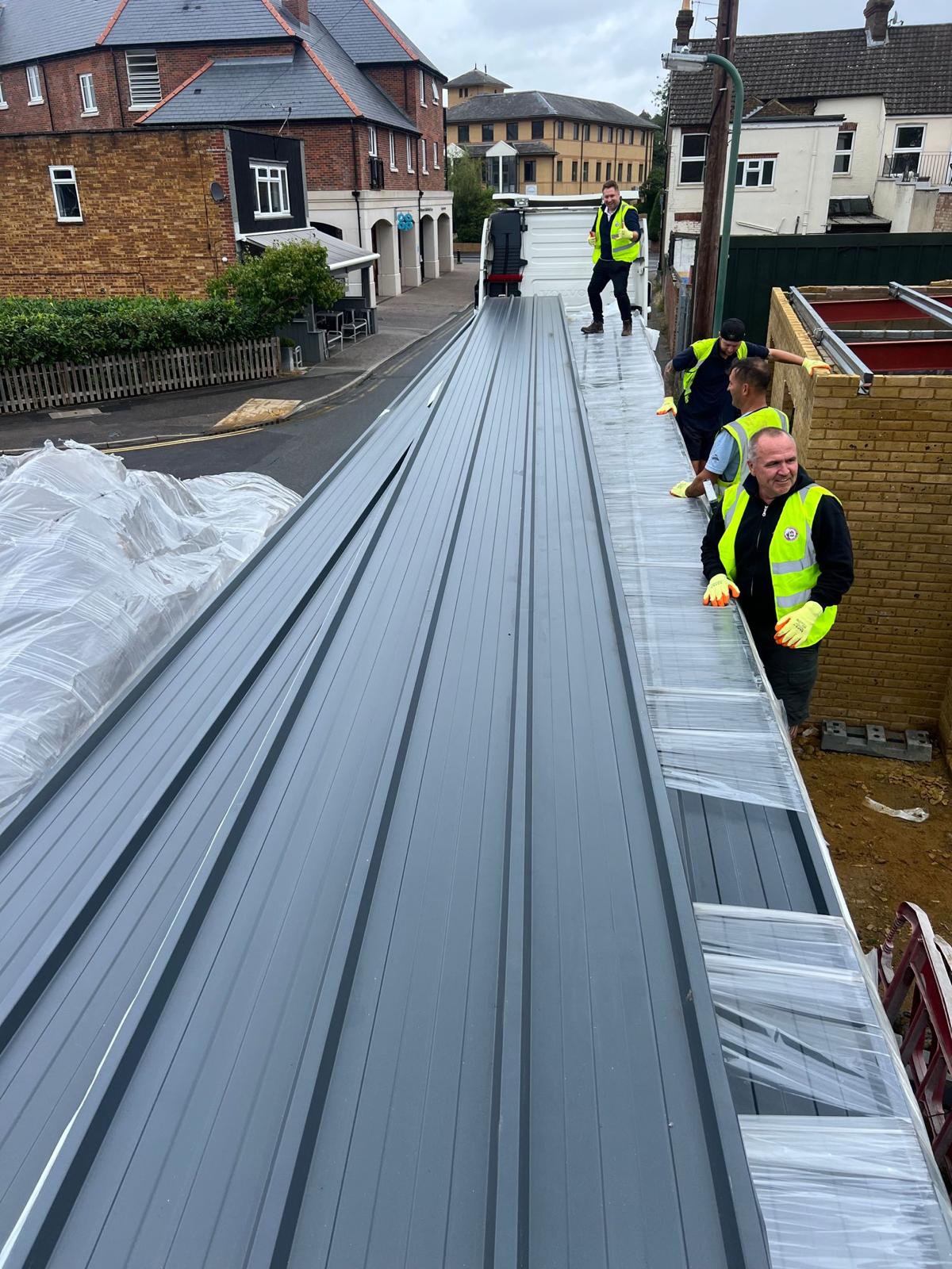 roofing materials being unpacked for roof installation